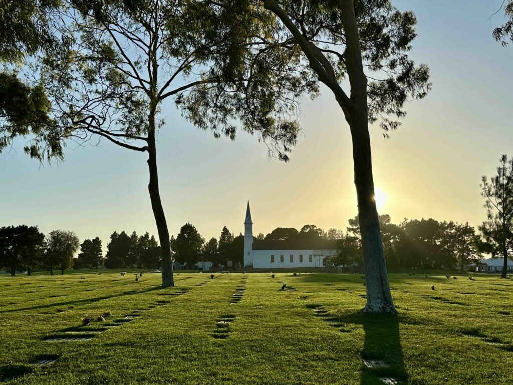 Bayer-Cemetery-Brokers-Forest-Lawn-Cypress-View-across-Eternal-Peace-Towards-Church-of-our-Fathers-at-Sunset