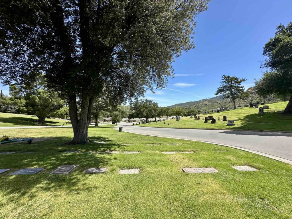 Eternal Valley Memorial Park Newhall View of Devotion Lawn with Pioneer in the background- Bayer Cemetery Brokers