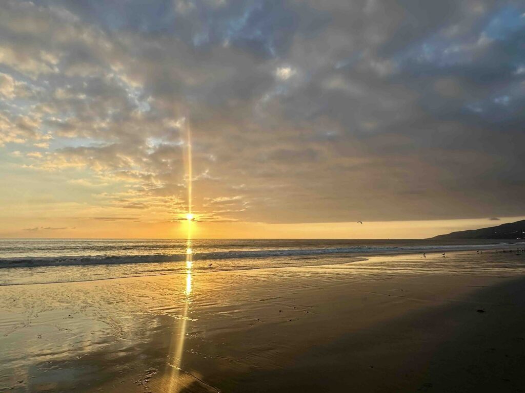 A peaceful Southern California sunrise over the Pacific Ocean, symbolizing renewal and hope for Easter 2026.