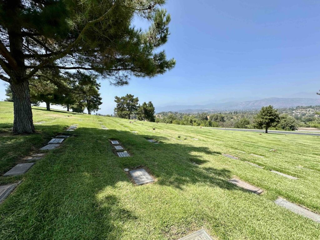 View across Inspiration lawn to the West and mountains at Forest Lawn Memorial Park Covina - Bayer Cemetery Brokers