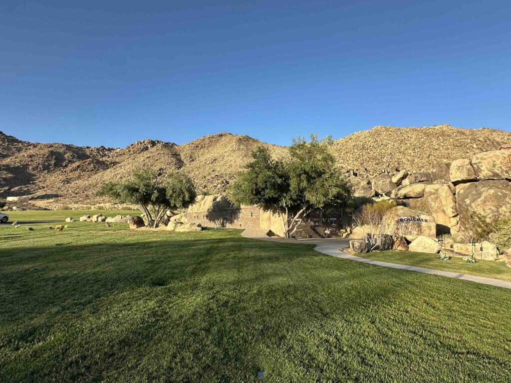 Sweeping vista showing Eternal Rocks deluxe companion Crypts in warm dusk light at Sunset Hills Memorial Park Apple Valley - Bayer Cemetery Brokers